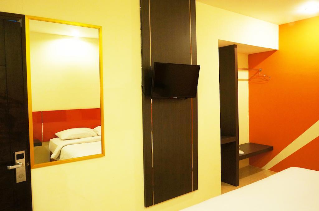 Quin Centro Hotel Palembang Rom bilde