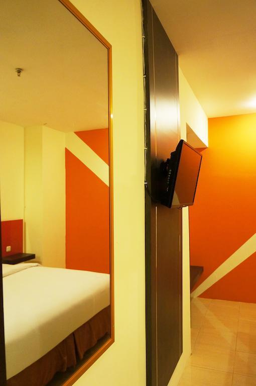 Quin Centro Hotel Palembang Rom bilde